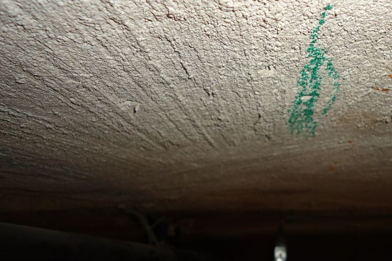 Green marks indicate joist while pipe is to lower left
